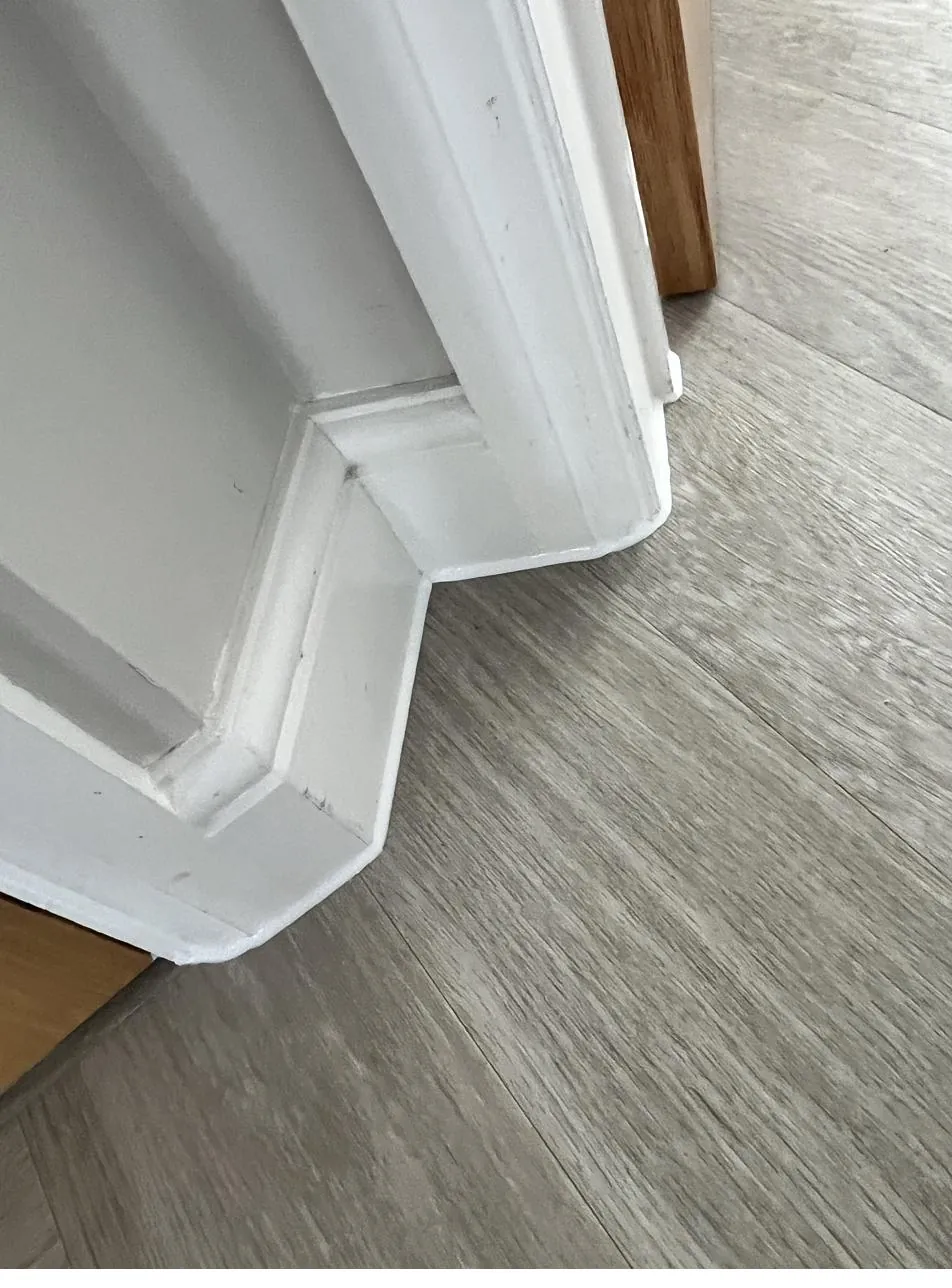 Skirting board corner detail, mitred and sealed